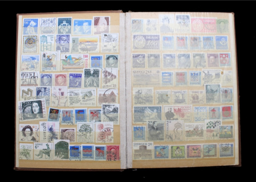 Лот почтовых марок. 773 шт. В альбоме 17×24,5 см., 8 листов