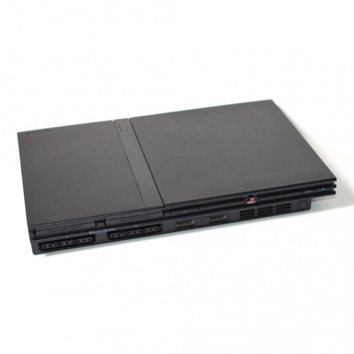 Sony PlayStation 2, рабочая. Без шнуров. В дисководе игровой диск «Властелин колец. Возвращение короля». Размер 23×15 см