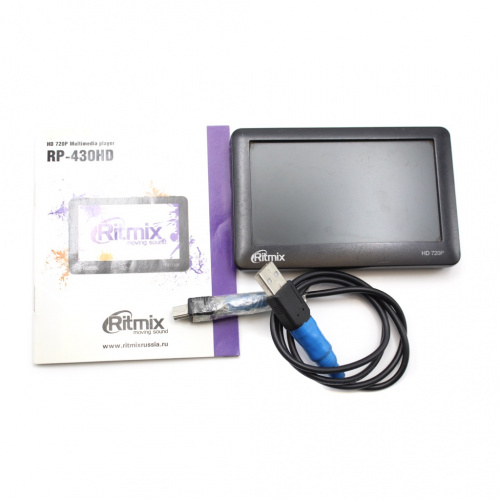 Мультимедиа плеер «Ritmix RP-430HD 4 Gb. Видео, музыка, фото, FM-радио, диктофон, читалка. Разъем для микроSD, выходы для наушников (2 шт.) и TV-out. Дисплей 4,3 дюйма. Вес 128 г. Размер 115×75×13 мм. Инструкция прилагается. В рабочем состоянии
