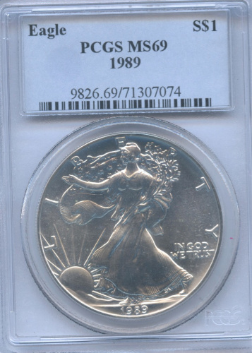 1 доллар — American Silver Eagle 1989. в слабе PCGS MS69