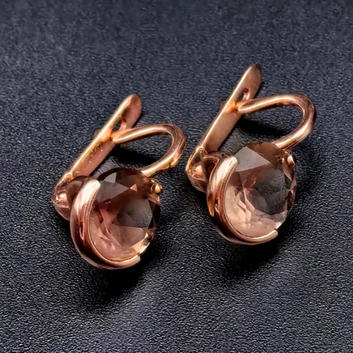 Серьги. Камни султаниты. Клеймо 585, ИДЯ. Размер 2,5 см. Вес 4,15 гр. Состояние превосходное 2008